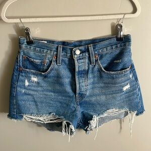 Levi’s 501 cut off shorts, light, blue, slight, distressed on pockets